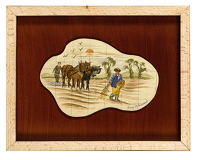 Farmers ploughing