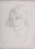 Portrait of a young girl with bead...
