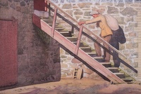 Man carrying a sack over his shoulder